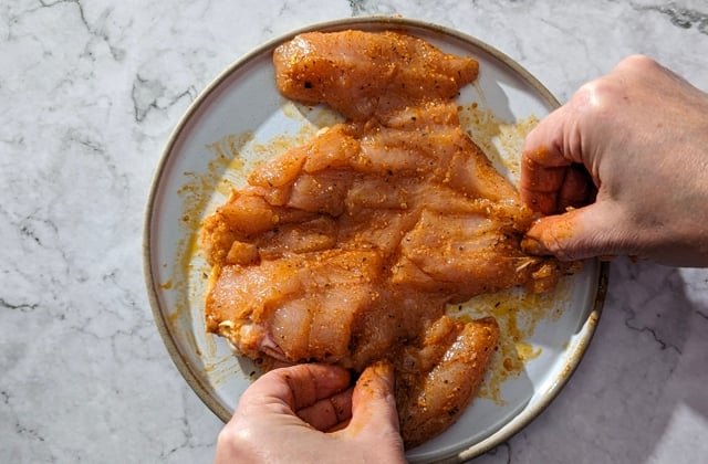 Chicken supreme marinated with paprika and buttermilk