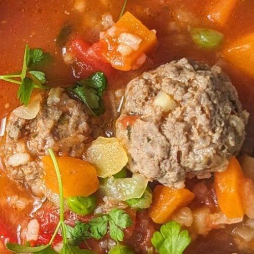 Romanian meatball soup is a tomato based soup that has chunky vegetables