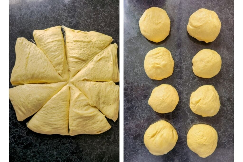 Sourdough brioche dough divided into eight pieces, then shaped into eight balls on a dark counter